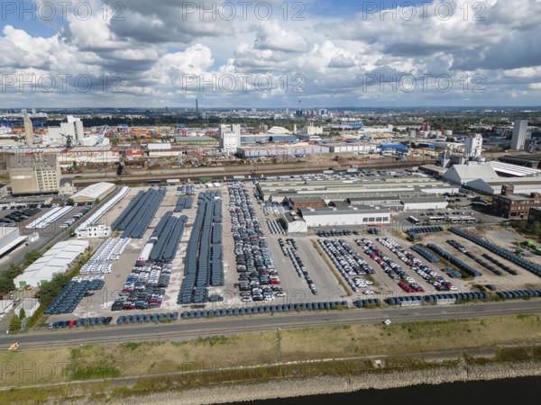 Car terminal in a port on the Rhine. Vehicles are stored, loaded and unloaded, and prepared for shipping
