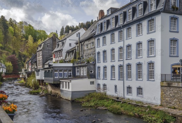 Historical houses along the Rur River in the historic center of Monschau, Germany, Europe