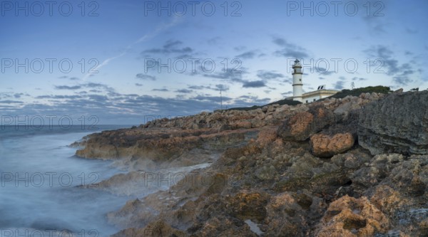A long exposure view of the Cap de ses Salines Lighthouse on Mallorca just before sunrise