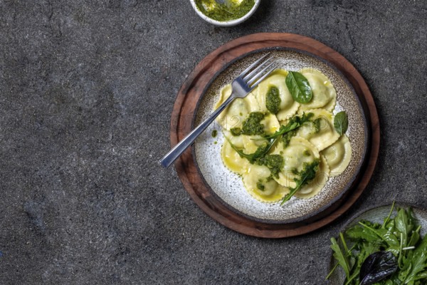Food, Italian spinach ricotta ravioli, Top view, black background, copy space, Vegetarian food, vegan ravioli