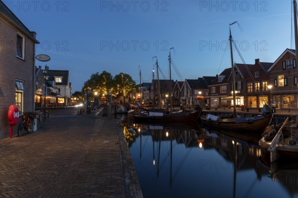 Evening mood, blue hour, old harbour at the Eemmeer, historic centre of Spakenburg, Bunschoten-Spakenburg, Utrecht, Netherlands