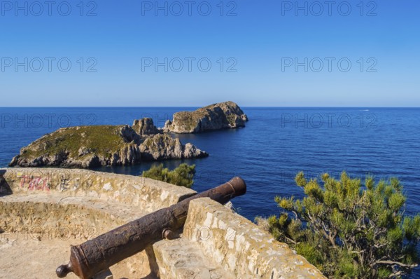 Old cannon cannon overhang the marine reserve of the Malgrats Islands northwest of the island of Palma de Mallorca