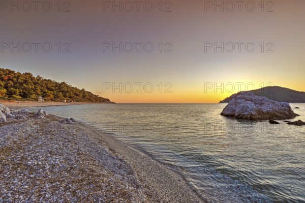 The sunset at the beach Milia of Skopelos island, Greece, Europe