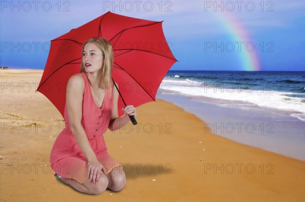 Beautiful woman holding a colorful umbrella