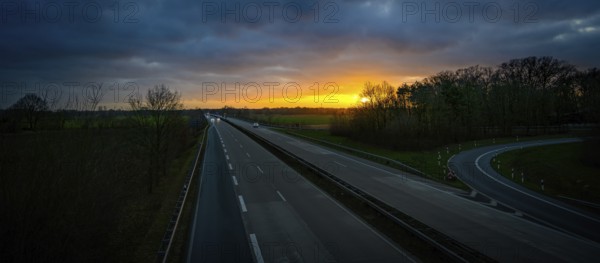 Motorway in the evening with sunset