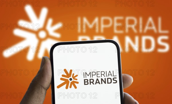 imperial brands logo is displayed on smartphone. Imperial Brands plc is a British multinational tobacco company