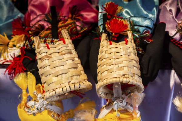Empty wicker baskets are seein a market place