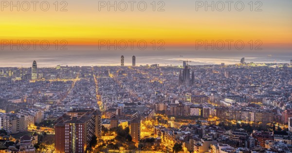 Barcelona with the Mediterranean Sea in front of sunrise