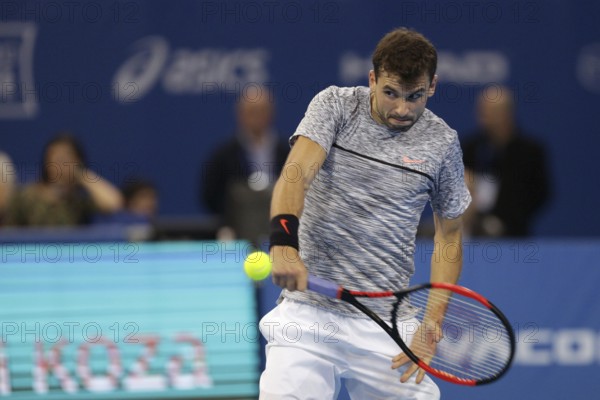 Sofia, Bulgaria - February 12, 2017: Grigor Dimitrov (pictured) from Bulgaria plays against David Goffin from Belgium during the final match from Sofia Open 2017 tennis tournament