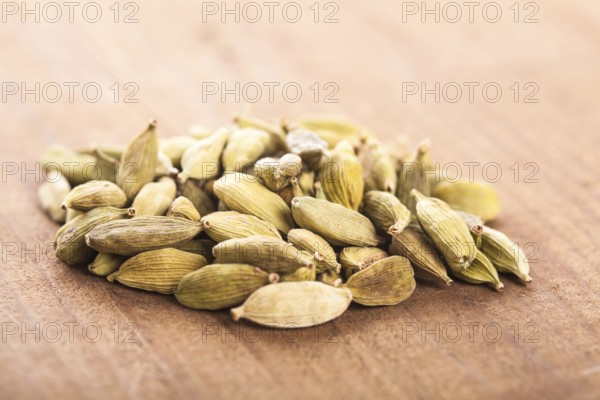 Cardamon heap on the wooden table