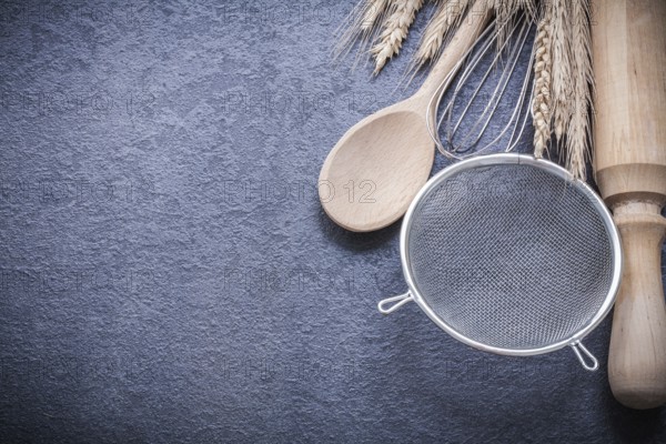Ripe wheat rye ears spoon rolling-pin egg whisk sieve