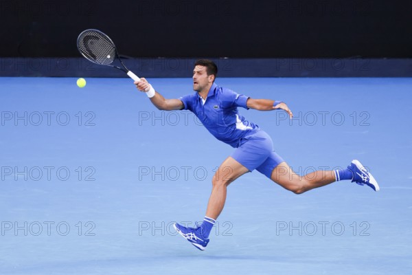 MELBOURNE, AUSTRALIA, JANUARY 11: Novak Djokovic of Serbia plays Stefanos Tsitsipas of Greece during a charity match ahead of the 2024 Australian Open at Melbourne Park on January 11, 2024 in Melbourne, Australia, Oceania