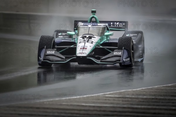 MARCUS ERICSSON (28) of Kumla, Sweden comes through turn 12 (Canada Corner) during a wet practice session for the XPEL Grand Prix at Road America in Elkhart Lake, WI