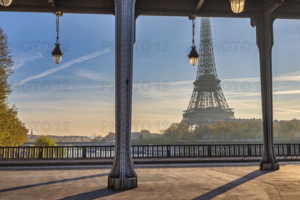 Paris France, sunrise city skyline at Eiffel Tower and Seine River Bir-Hakeim Bridge
