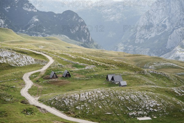 Triangular houses at the foot of the mountains in the north of Montenegro., Šavnik, Montenegro, Europe