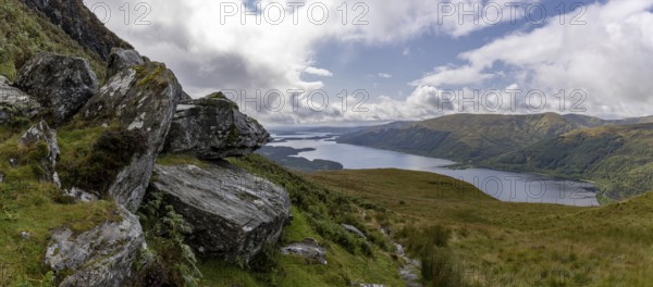 Rocks at the summit and views of Loch Lomond and the Loch Lomond and the Trossachs National Park area, Ben Lomond, Rowardennan, Scotland, United Kingdom, Europe