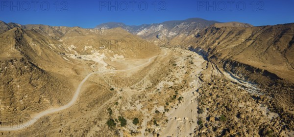 Landscape in Oman, mountains, Wadi Ashawq, road, dry riverbed Salalah, Al Mughsyal / Wadi Ashawq, Dhofar, Oman, Asia