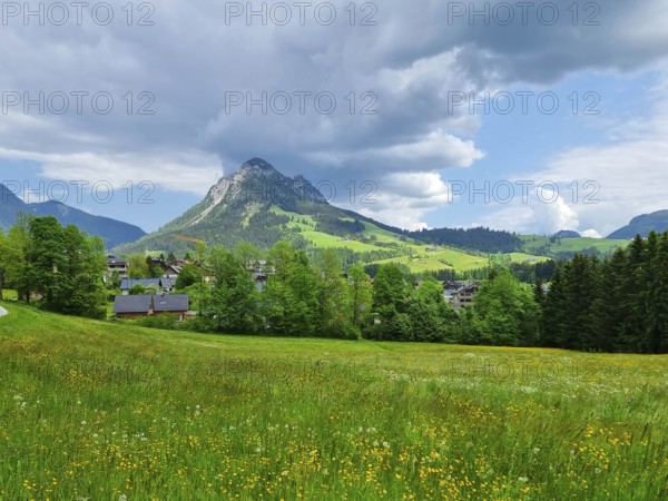 Summer austrian landscape with green meadows and impressive mountains, view from small alpine village Tauplitz, Styria region, Austria, Europe