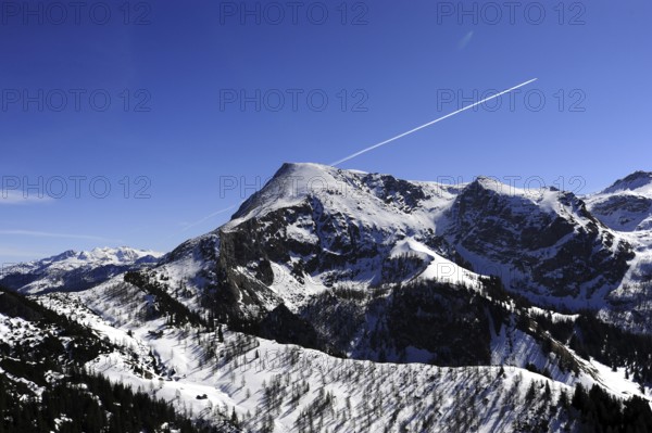 Stripes of condensation in the blue sky, on Jenner Mountain, Schönau am Königssee, Berchtesgaden nature park Park, Berchtesgaden Alps, Upper Bavaria, Bavaria, Germany, Europe
