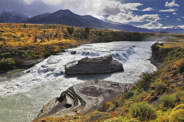 The majestic cascading waterfall - Cascades Paine. National Park Torres del Paine in southern Chile, Patagonia