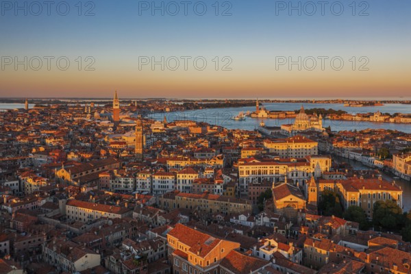Great sunset mood over the cityscape of the Italian travel destination Venice