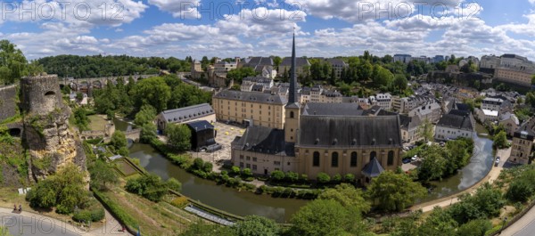 Panorama of Neumünster Abbey, surrounded by Alzette river, in the Grund district of Luxembourg City