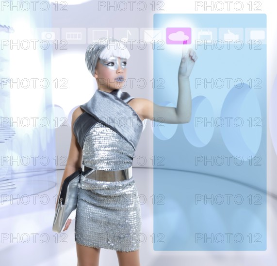 Futuristic children girl in silver touch finger icloud icon glass holographic screen
