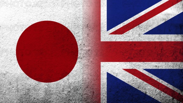 National flag of United Kingdom (Great Britain) Union Jack with National flag of Japan. Grunge background