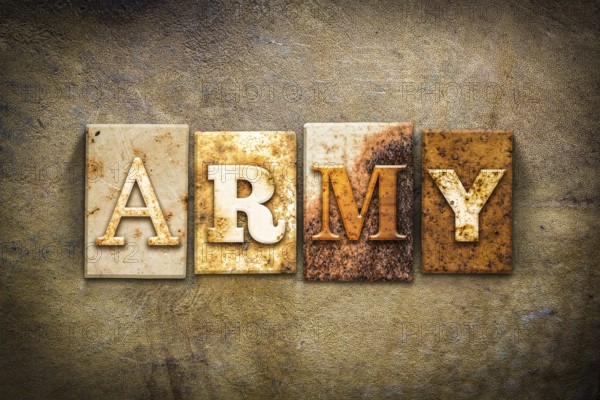 The word ARMY written in rusty metal letterpress type on an old aged leather background