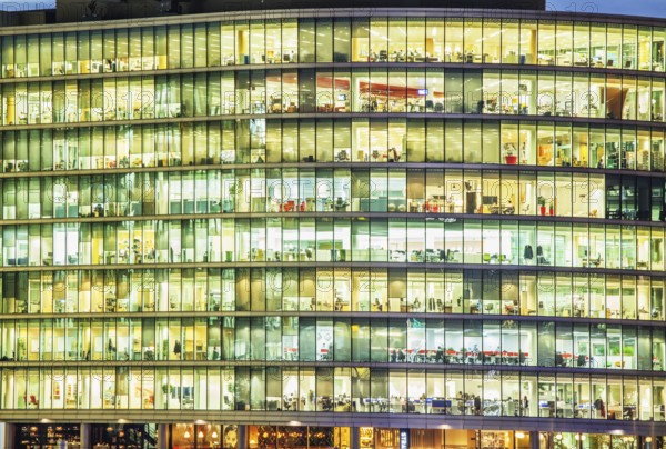 Modern office at night, showing the daily activity of office workers
