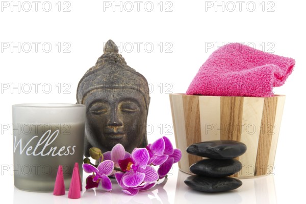 Stilllife with wellness objects as buddha towels and orchid flowers