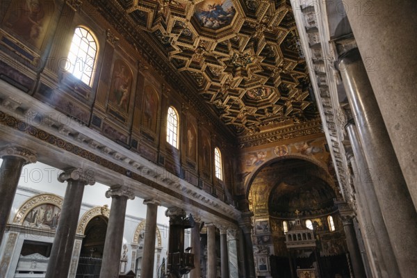 Rome, Italy, August 18, 2016: Interior view of church of Santa Maria in Trastevere. It is a titular minor basilica in the Trastevere district of Rome, and one of the oldest churches of Rome, Europe