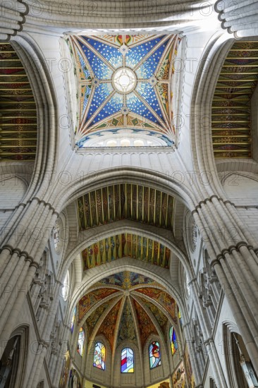 Almudena Cathedral: Iconic seat of Madrid's Archdiocese, built over a century, consecrated in 1993, adjacent to the Royal Palace