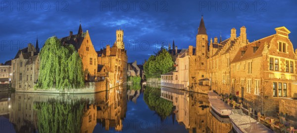 Bruges Belgium, night panorama city skyline at Rozenhoedkaai Dijver Canal with Belfry Tower