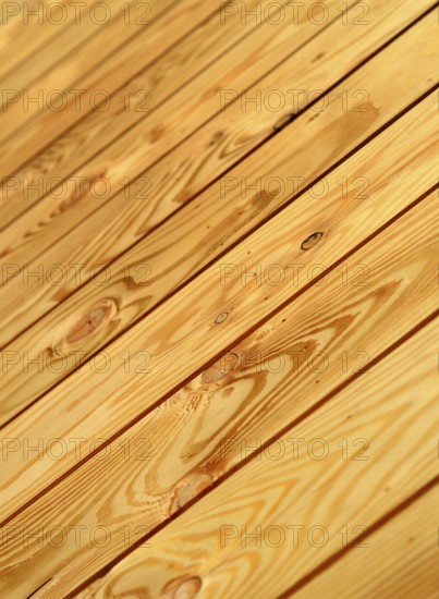 A Background Texture Of Unvarnished Wooden Flooring