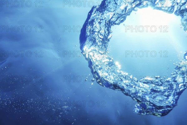 Bubble Ring Underwater ascends towards the Sun