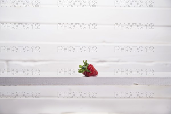 Presentation of seasonal fruits, fresh whole strawberries