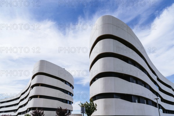San Sebastian de los Reyes, Spain, May 15, 2021: Luxury New Residential Development in Madrid. Precast Concrete Facades with Terraces. Real Estate and construccion industry concepts, Europe