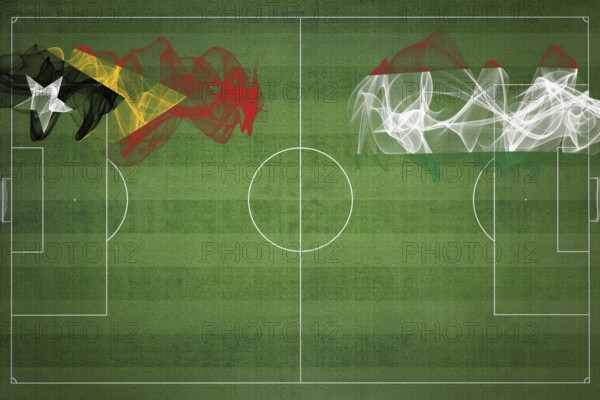 East Timor vs Hungary Soccer Match, national colors, national flags, soccer field, football game, Competition concept, Copy space