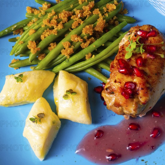 Chicken roulades with Polish dumplings (kopytka) and green beans