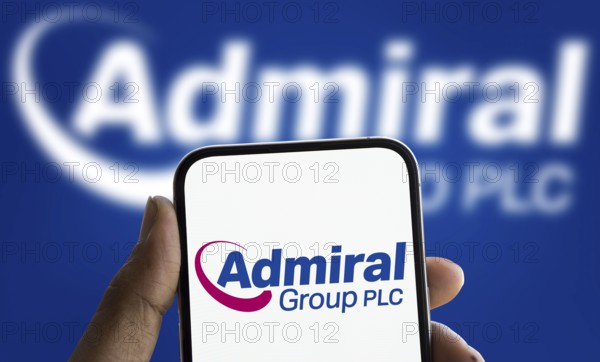 Admiral group plc logo is displayed on smartphone