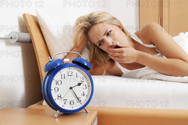 Insomnia with clock at night. Wife cannot sleep. Austria