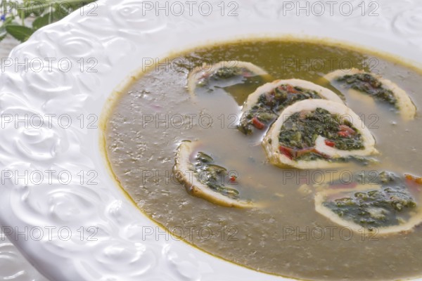 Cabbage soup with meat rolls