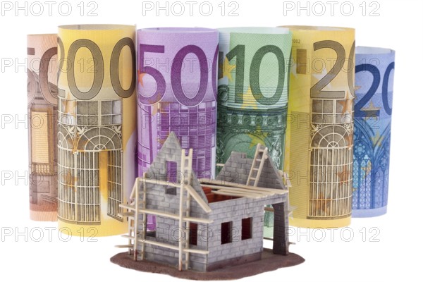 Many euro banknotes with shell house. Against a white background Austria
