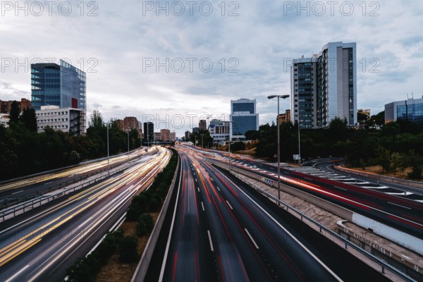 M30 motorway in Madrid at sunset. Long exposure with traffic light trails