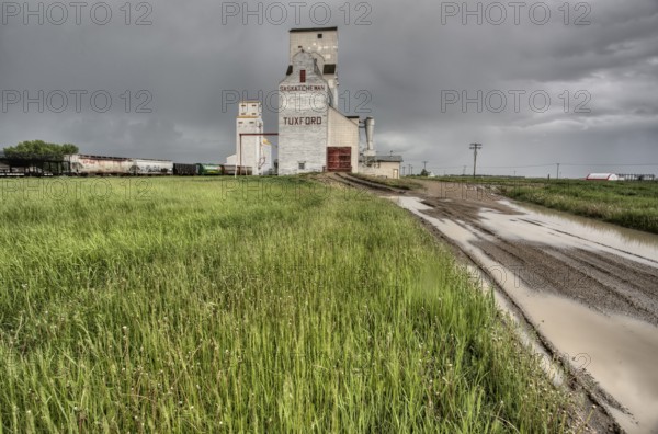 Prairie Grain Elevator in Saskatchewan Canada with storm clouds