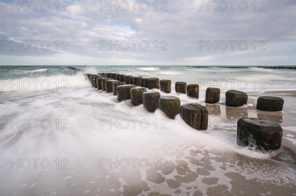 Groynes on the coast of the Baltic Sea on a stormy day