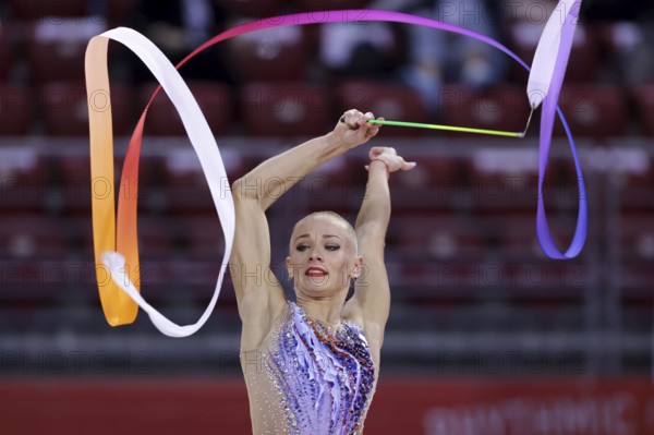 Sofia, Bulgaria - 27 March, 2021: Ekaterina Vedeneeva of Slovenia performs during the individual Ribbon final at the 2021 Rhythmic Gymnastics Sofia World Cup, Sofia, Bulgaria, Europe