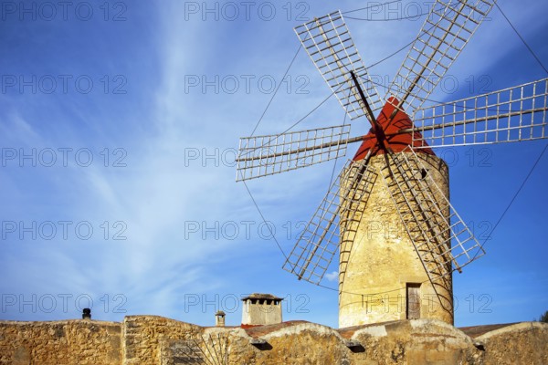 An old windmill in Algadia Mallorca Spain