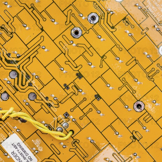 An up close vie of a circuit board of the LED lights found inside a traffic light